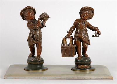 Lot 2299 - Pair of Patinated-Bronze Figures After a model...