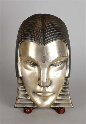 Lot 2378 - Art Deco Silvered and Patinated-Metal Mask In...