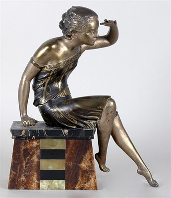 Lot 2599 - Art Deco Patinated-Metal and Onyx Figure In...