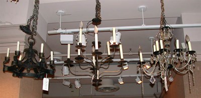 Lot 464 - Two Iron Chandeliers Including a six-light and...