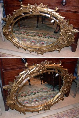 Lot 1151 - Pair of Floral Decorated Gilt Oval Mirrors...