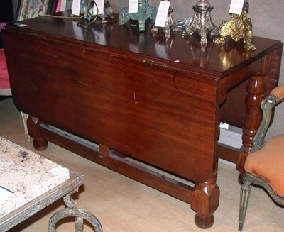 Lot 296 - Continental Mahogany Drop-Leaf Dining Table...