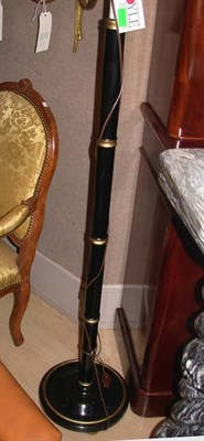 Lot 1288 - Pair of Ebonized and Parcel Gilt Two-Light...