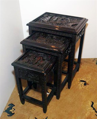 Lot 3381 - Chinese Carved Hardwood Nest of Three Tables...