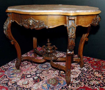 Lot 2383 - Victorian Carved Mahogany Center Table The...