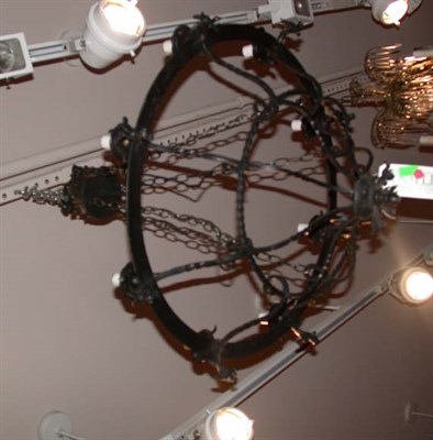 Lot 1586 - Scrolled Iron Eight-Light Chandelier