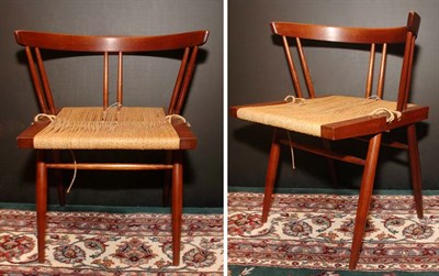 Lot 232 - Pair of George Nakashima Walnut Dining Chairs...