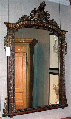 Lot 405 - Italian Parcel Gilt Carved Walnut Mirror...