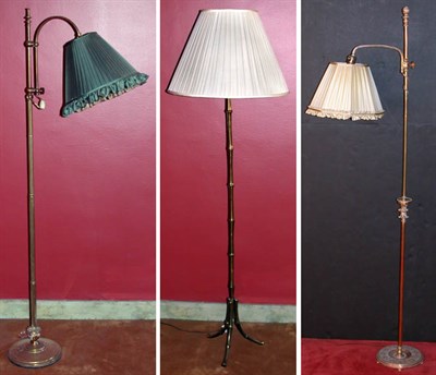Lot 181 - Three Standing Lamps Each with silk pleated...
