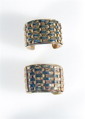 Lot 435 - Pair of Chanel Gilt-Metal Basket Weave Cuffs...