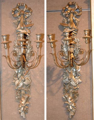 Lot 3485 - Pair of Painted and Trophy Carved Three-Light...