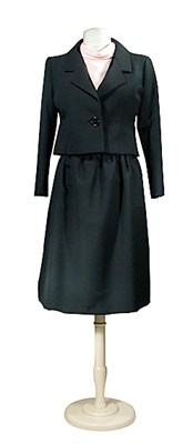 Lot 119 - Norell Black Silk and Wool Suit American, 1965,...