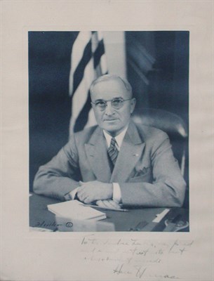 Lot 2021 - TRUMAN, HARRY S. Photograph inscribed in...