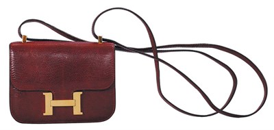 Lot 226 - Hermes Wine Lizard Baby Constance Bag...