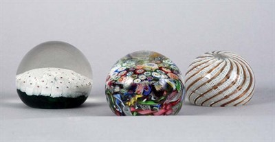Lot 4085 - Three Glass Paperweights Including one signed...