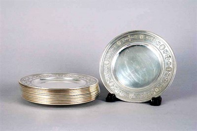 Lot 4090 - Twelve Sterling Silver Bread Plates Total...