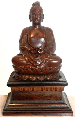 Lot 3501 - Asian Wood Meditating Immortal On a wood base....
