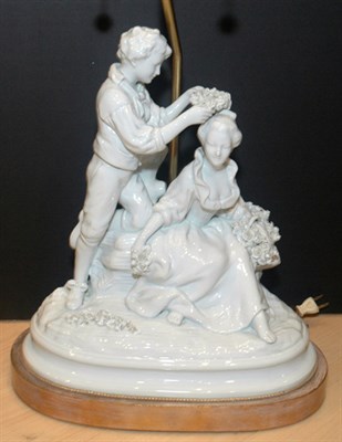 Lot 385 - Continental Porcelain Figural Two-Light Lamp...