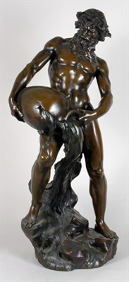 Lot 2569 - Patinated-Bronze Figure Of a male nude holding...