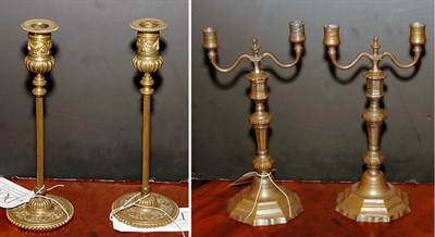 Lot 496 - Pair of Regence Bronze Two-Light Candelabra...