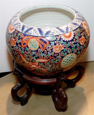 Lot 3620 - Chinese Ceramic Jardiniere on Carved Wood Stand
