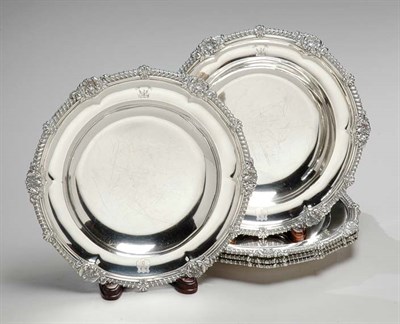 Lot 212 - Set of Four George III Silver Soup Plates...
