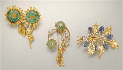 Lot 1027 - Three Gold, Diamond and Gem-Set Flower Brooches