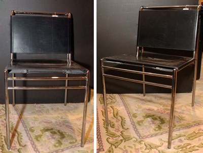 Lot 183 - Six Leather and Chrome Dining Chairs Designed...