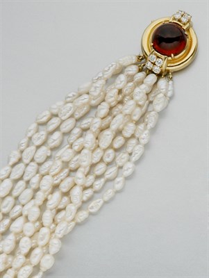 Lot 959 - Eleven Strand Freshwater Pearl Torsade Bracelet
