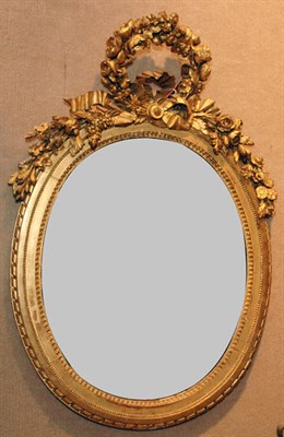 Lot 2674 - Louis XVI Style Gilt-Wood Mirror Of oval form,...