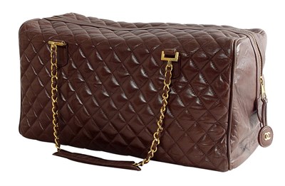 Lot 283 - Chanel Chocolate Leather Quilted Travel Bag...