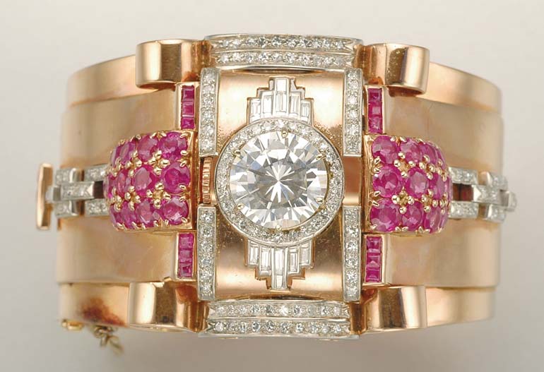 Lot 1044 - Two-Color Gold, Diamond, Simulated Diamond and Ruby Cuff Bangle