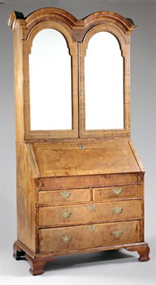 Lot 419 - George II Walnut Double-Dome Bureau Bookcase...