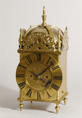 Lot 442 - English Brass Lantern Clock The floral...