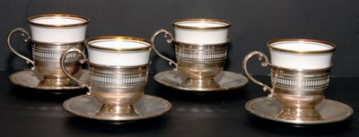 Lot 449 - Eleven Cartier Sterling Silver and Porcelain...