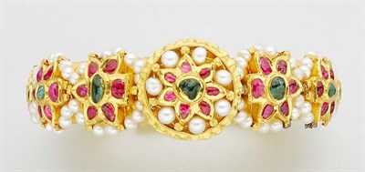 Lot 1118 - Indian Gold, Foiled Back Ruby and Emerald and Pearl Bangle