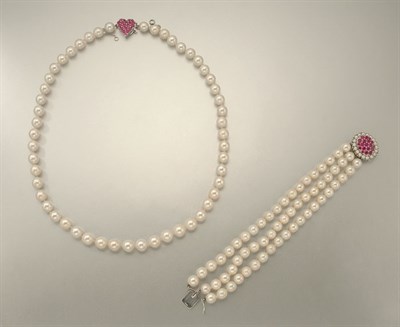 Lot 1204 - Cultured Pearl Necklace and Bracelet with Ruby Clasps