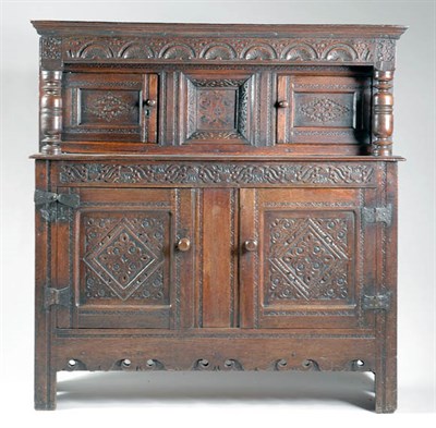Lot 302 - Charles II Carved Oak Court Cupboard The...