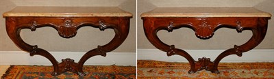 Lot 270 - Pair of Continental Rococo Mahogany Consoles...