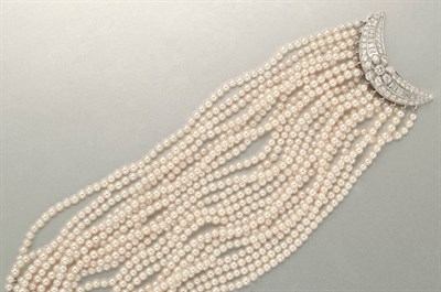 Lot 1088 - Twenty Two Strand Cultured Pearl and Diamond Torsade Bracelet