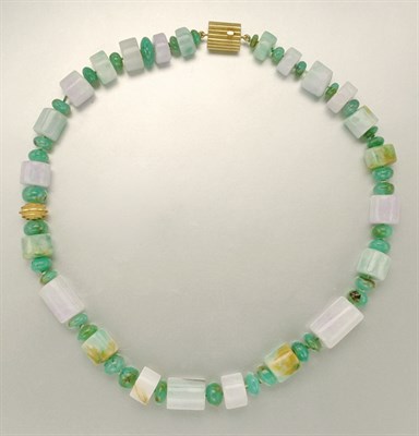 Lot 1144 - Gold, Lavender Jade, Jade and Serpentine Bead Necklace