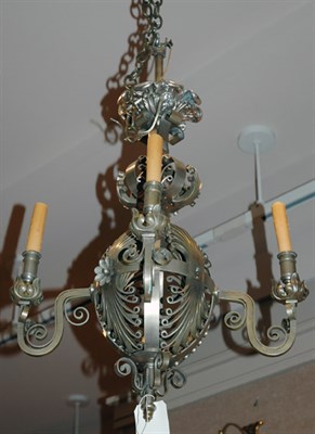 Lot 4308 - Rococo Style Scrolled Iron Four-Light Chandelier