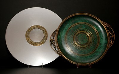 Lot 179 - Patinated-Metal Charger; Together with a...