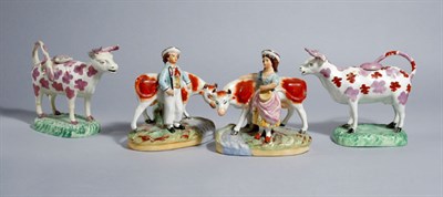 Lot 2153 - Two Staffordshire Pink Lustre Pottery Cow...