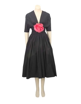 Lot 27 - Traina-Norell Black Silk Cocktail Dress...