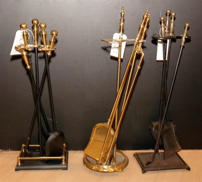 Lot 404 - Three Sets of Brass and Iron Fireplace Tools