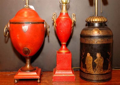 Lot 470 - Three Tole Lamps Including two two-light lamps.