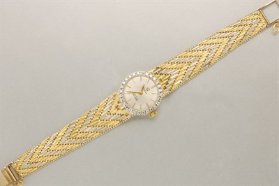 Lot 1092 - Two-Color Gold and Diamond Wristwatch