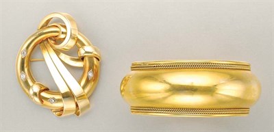 Lot 1277 - Gold Cuff Bangle and Diamond Circle Bow Brooch