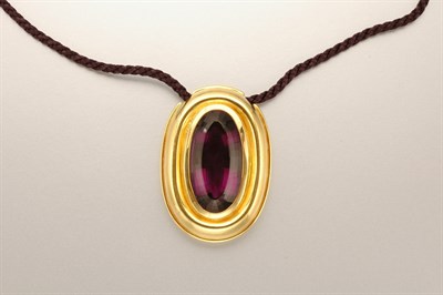 Lot 1389 - Gold and Amethyst Pendant with Cord